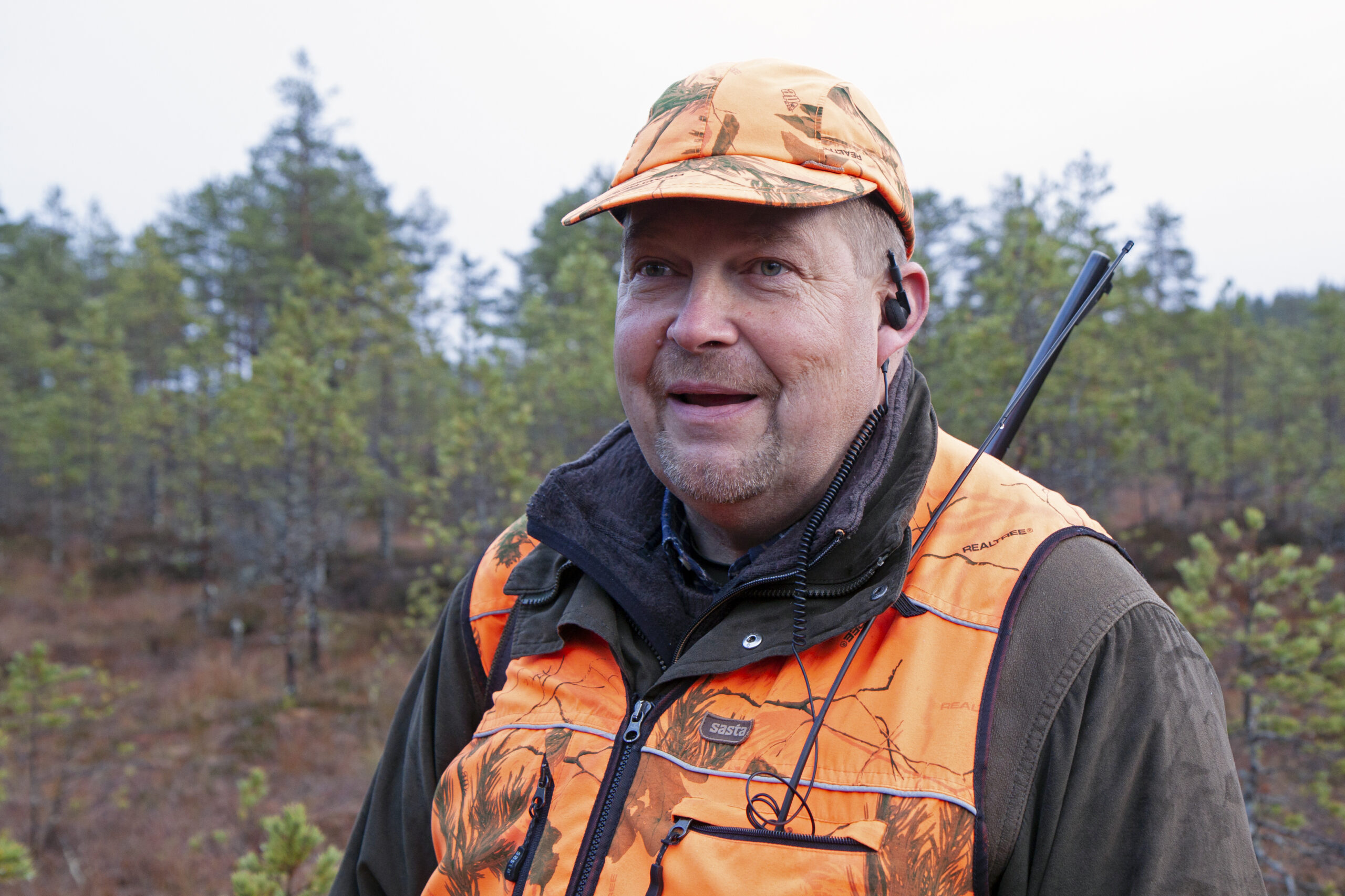 Juha-Matti Valonen looks at forests as an environmental expert and a hunter. "There is an exceptional volume of information on forests in Finland, but to make use of it, you still need men in rubber boots, like me." Photo: Anna Kauppi